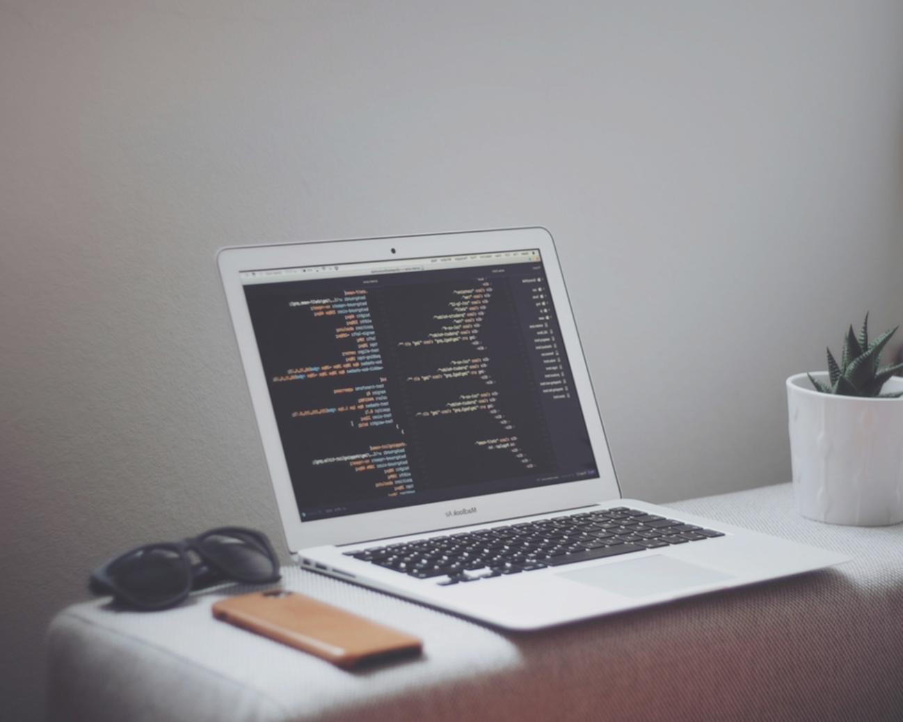 Modern workspace showing dApp development process